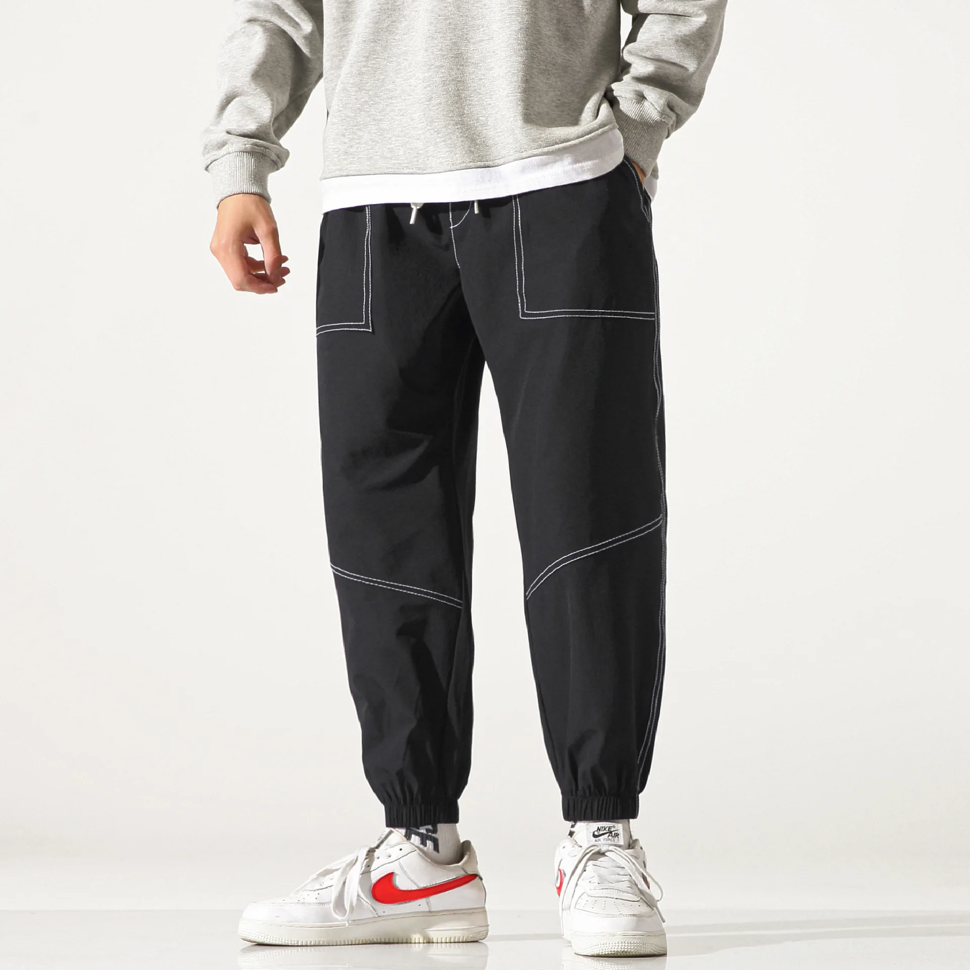 

Универсальные модные леггинсы со средней посадкой, спортивные длинные брюки свободного кроя, повседневные штаны для молодых мужчин, весенний сезон, защита от сминания