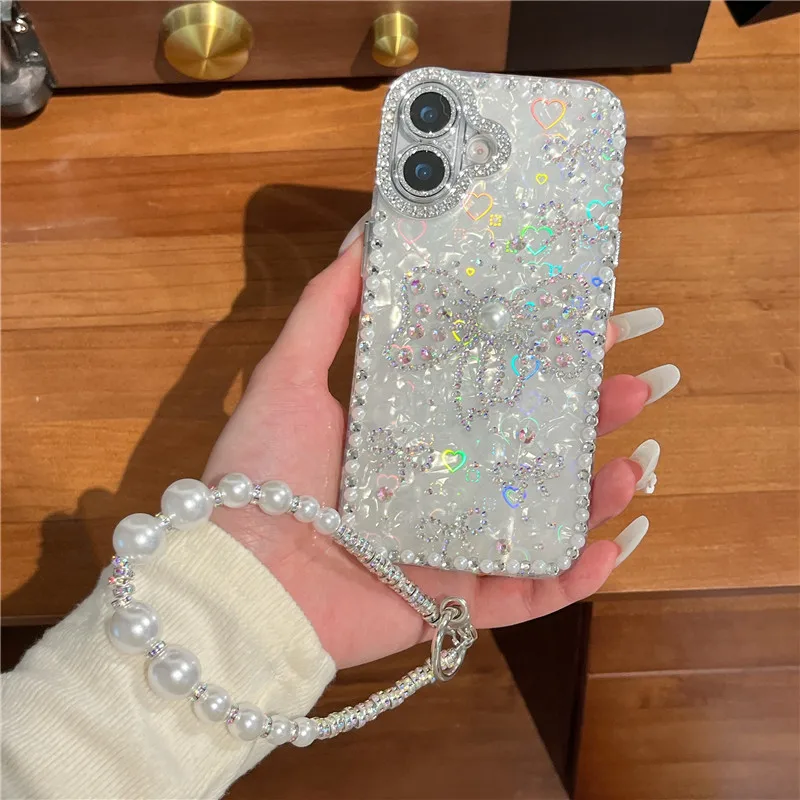 

Блестящий чехол-ракушка с бантом и цепочкой-браслетом для iPhone 17 Pro Max, 16, 15, 14, 13, Air, с лазерным сердечком