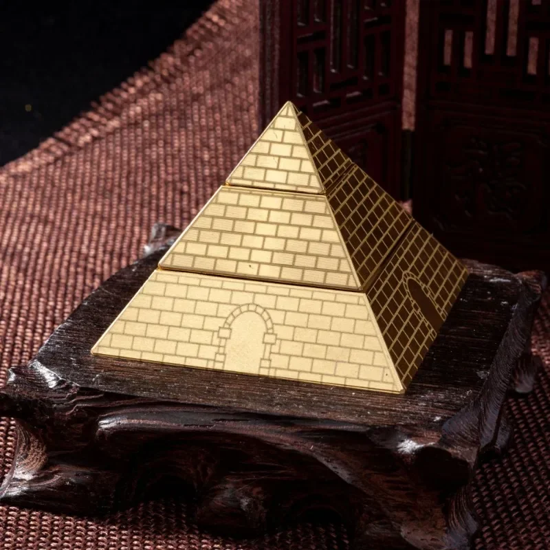 Brass pyramid tabletop ornament