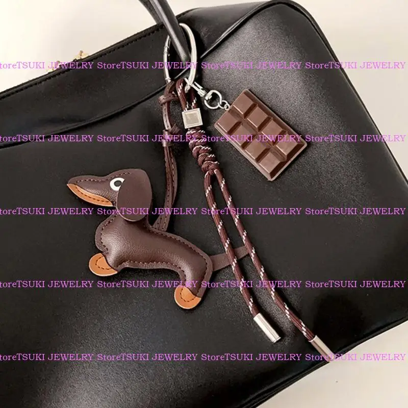 62KE الجلود الجلدية المدمن على حبل مضفر معلقة زخرفة سلسلة مفاتيح القلادة لمفاتيح السيارات وأكياس سحر ملحقات سحر