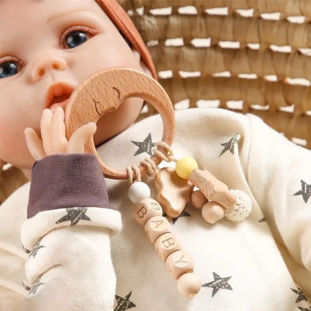 Cute Anti-lost Wooden Baby Rattle Toy Adjustable Montessori Handbell Rattle Toy Food Grade Silicone Wooden Rings Toy Kids