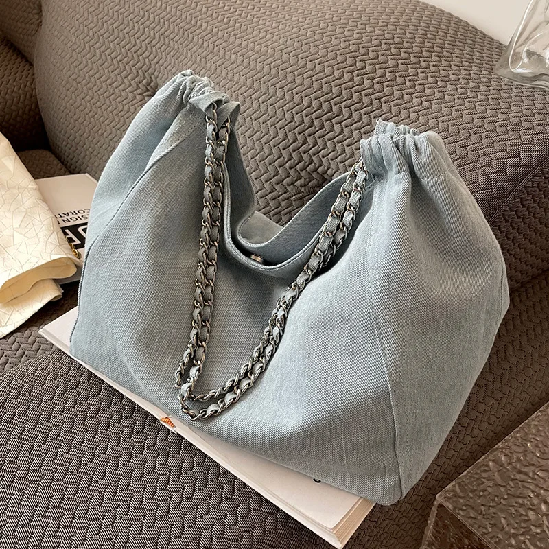Picture 6: Denim durable women's single-shoulder bag, large-capacity drawstring drawstring opening commuter travel crossbody bag