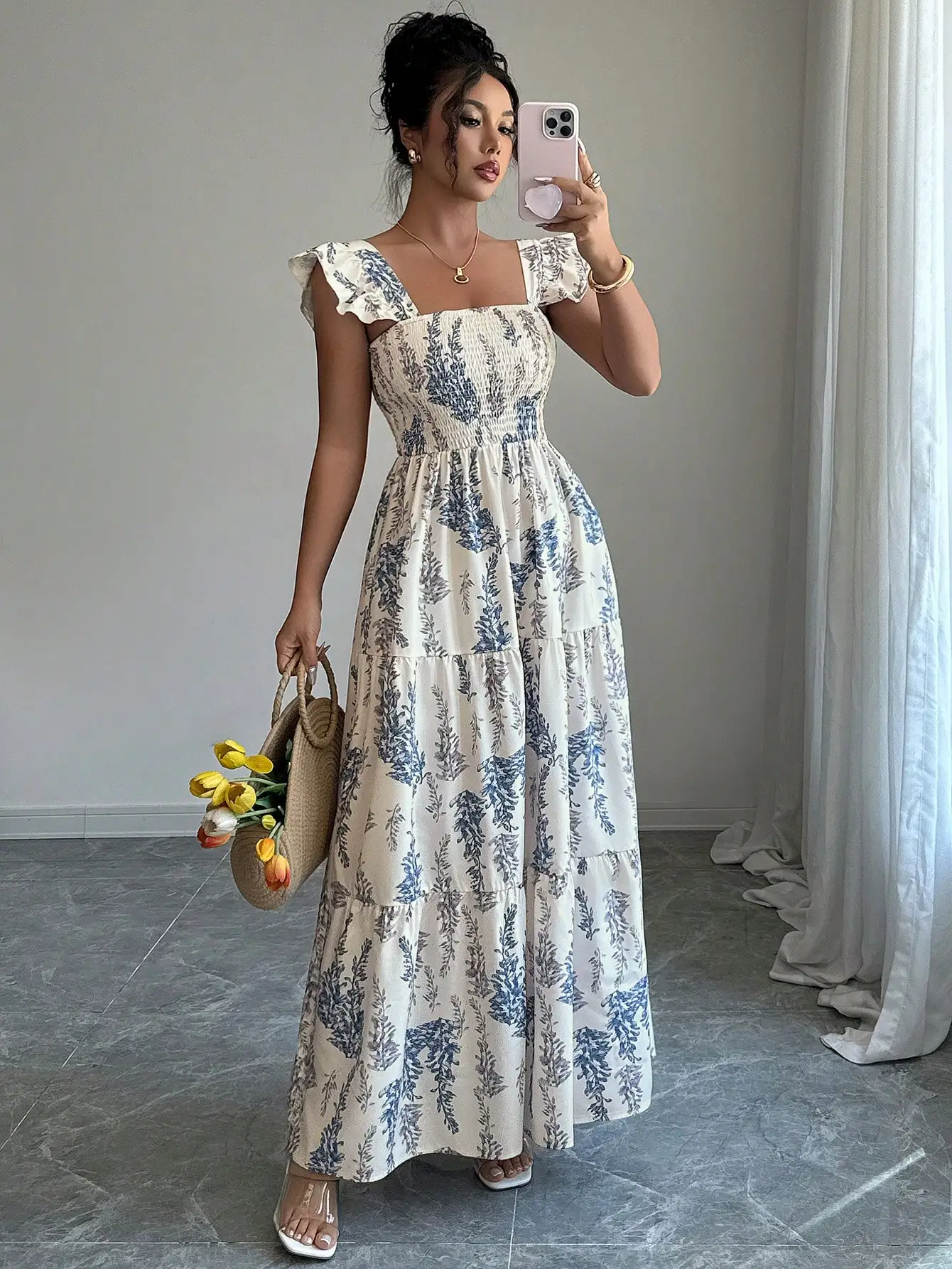 

Blue Floral Print Tiered Maxi Dress with Ruffle Cap Sleeves and Smocked Waist