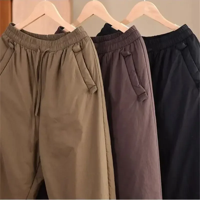 กางเกงขายาวผู้หญิงผ้าฝ้ายลายสก็อตแบบผูกเชือกรุ่นใหม่ปี 2025 สไตล์ลำลอง สีพื้น ทรงหลวม อุ่นสบาย เหมาะสำหรับฤดูใบไม้ร่วงและฤดูหนาว