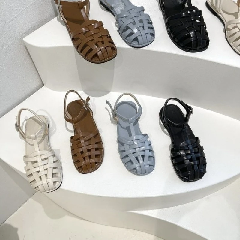 2026hot Large size sandals women's summer new flat-bottomed Roman sandals woven one-word buckle bag head sandals women