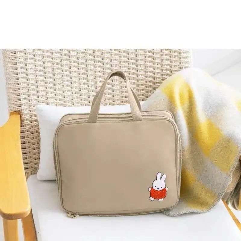 ​ ​ Miffy-Bolsa de almacenamiento de viaje Kawaii, bolsa organizadora de ropa de conejito de dibujos animados portátil para maleta, artículos esenciales de viaje multifuncionales