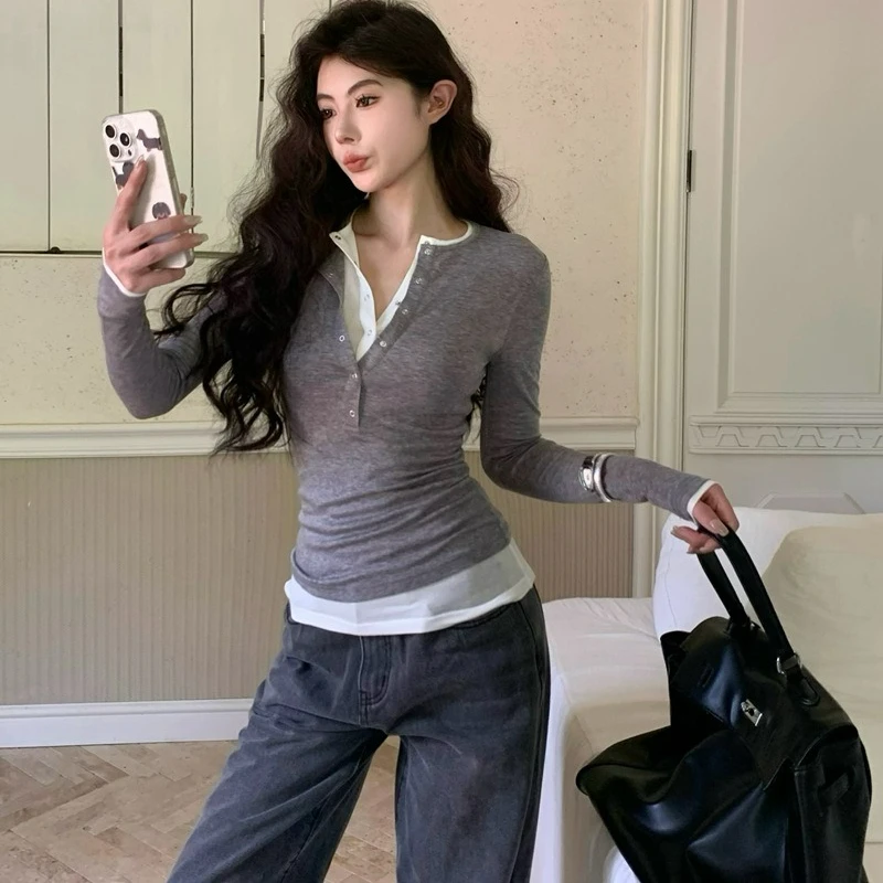 

Sweet Spicy Girl Style Half-open Collar Fake Two Long-sleeved T-shirt for Women 2026 Autumn New Fashion Slimming Solid Color Top