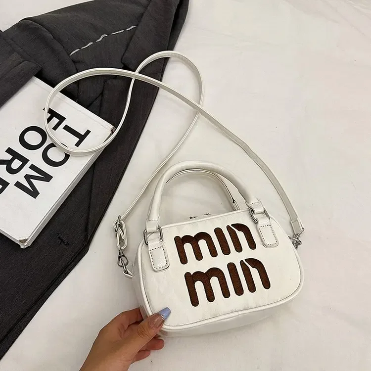 

Niche High-value Portable Bucket Bag Women's Four-season High-value Versatile Shoulder Bag Commuter Messenger Bag Bag