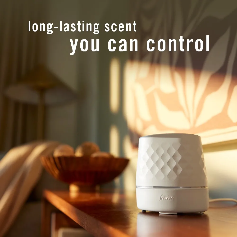 

Febreze PLUG Scent Booster Continuous Scent Device Oil Diffuser