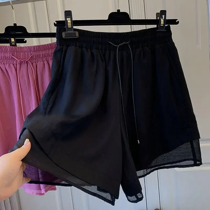 Pantaloni corti da donna larghi boxer neri trasparenti per la casa design classico abbigliamento di moda 2025 comodi pantaloncini economici eleganti XL per le donne