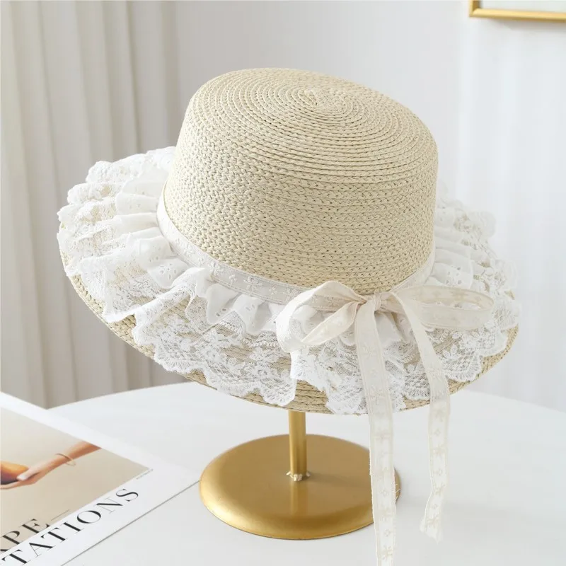 A hollowed-out lace woven hat for women's outdoor vacation style with large brim and