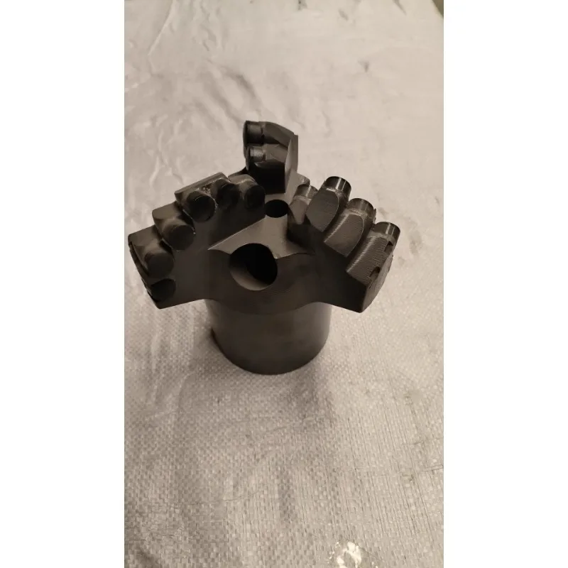 Diamond compact coreless stepped water well bit arc angle bit for mine