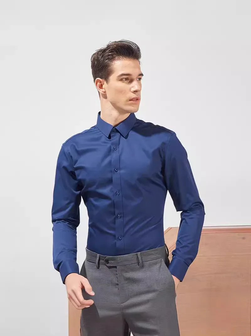 زائد 8XL 7XL 6XL الرجال قميص رسمي للأعمال كم طويل الربيع عادية تمتد المضادة للتجاعيد بلون فستان اجتماعي أسود أبيض 125 كجم