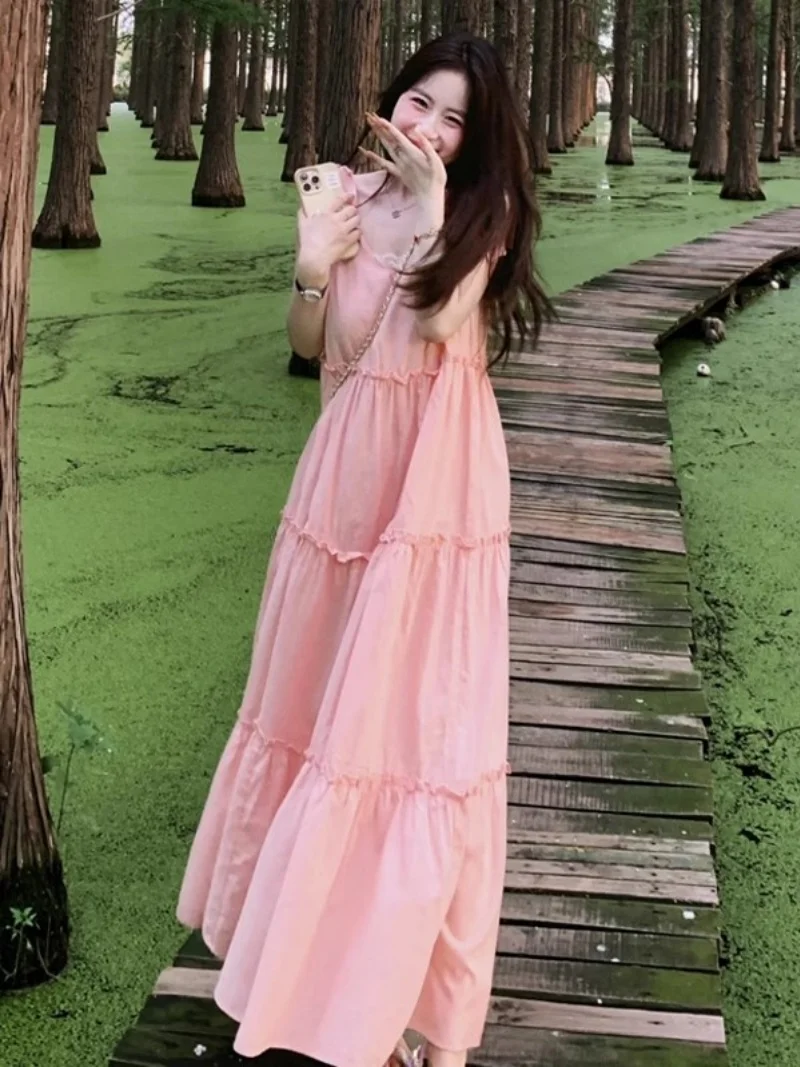 Vestido largo de playa sin mangas 2025 verano rosa francés dulce lindo pequeño fresco correa vestido de vacaciones en la playa w127
