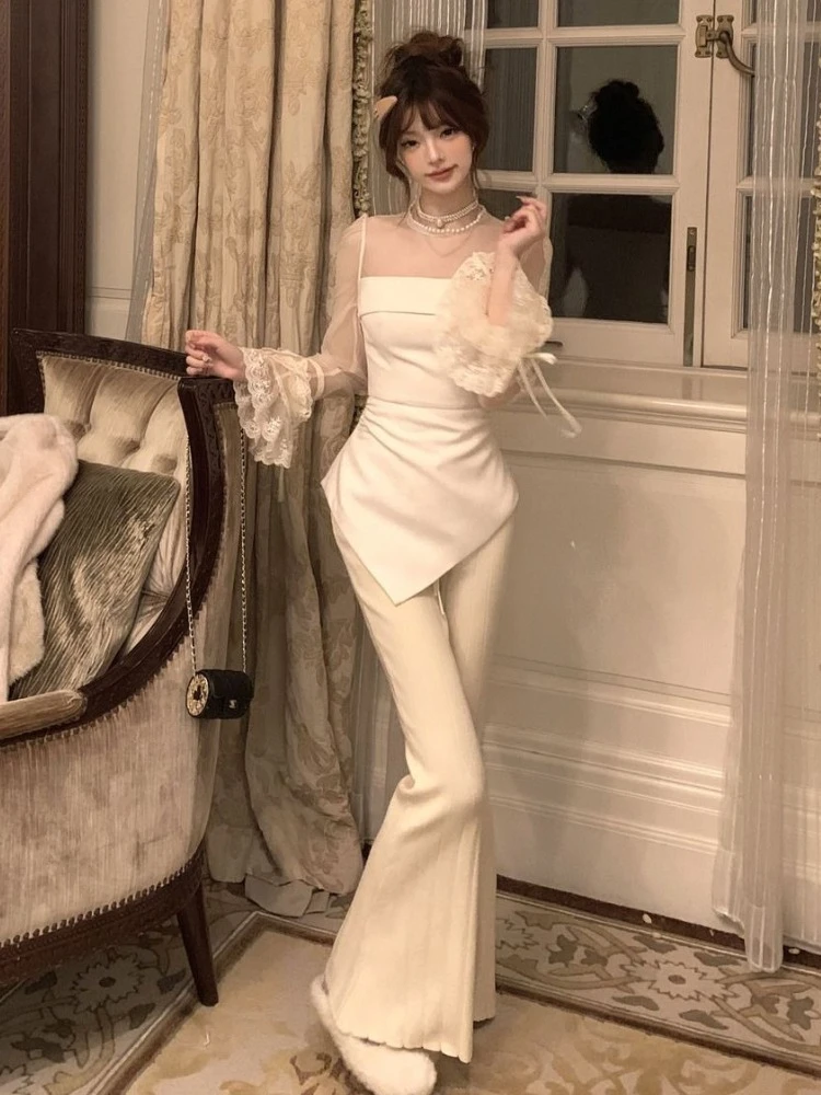 Inverno Nuovo Design Vedere Attraverso Maglia Nera T-shirt a maniche lunghe Donna Y2k Irregolare Slim Fit Magliette e camicette Francese Dolce Elegante Chic Abiti