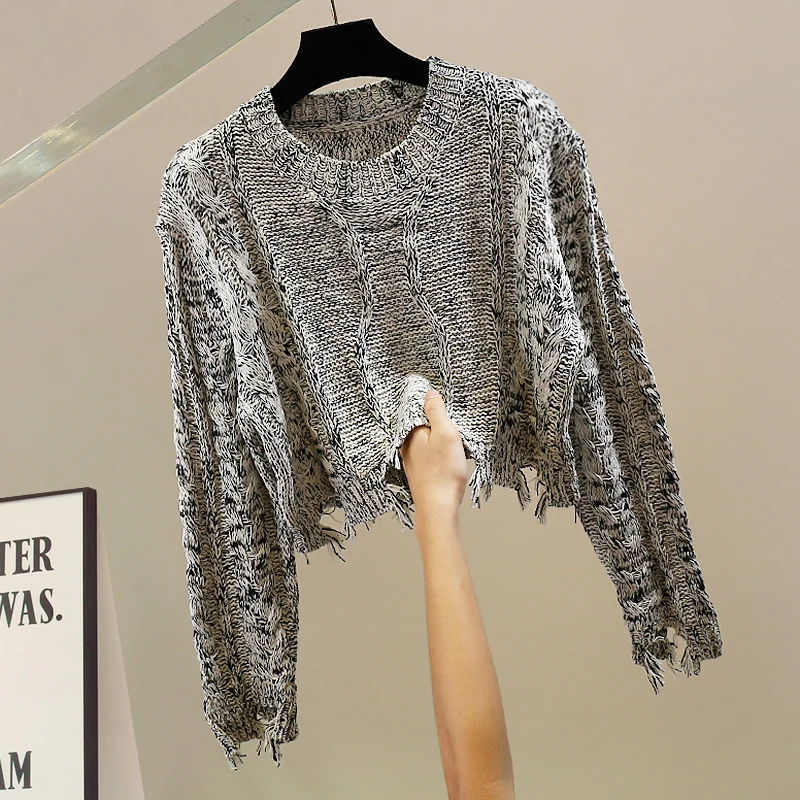 

Корейский модный вязаный свитер с длинными рукавами из пряжи, с эффектом похудения, с дизайнерским декором в виде разрывов, для повседневной носки.