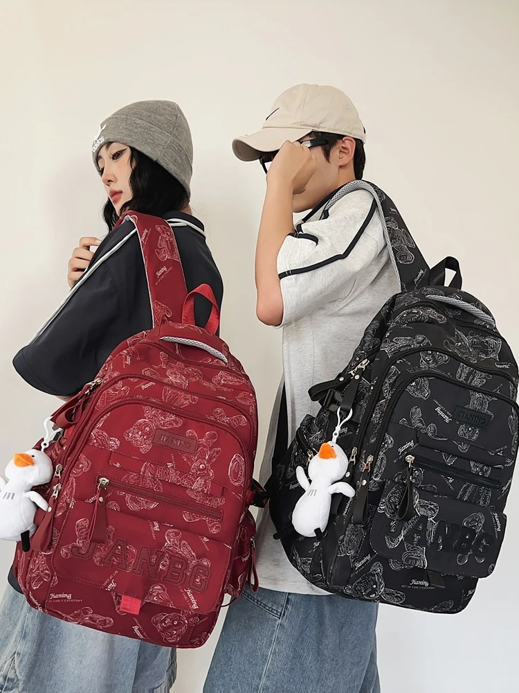 

Large Capaci Printed Bapa for High School Students Lightweight Dual-oulder Bag Casual Commuter Sle Nylon Material