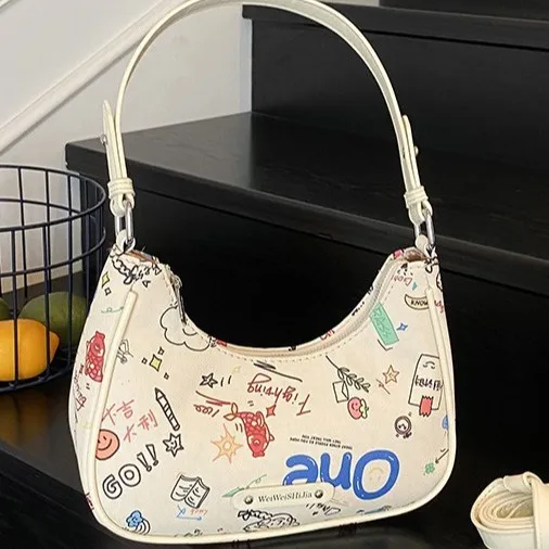 

2025 New Graffiti Shoulder Bag Stylish Womens Tote Versatile Commuter Handbag Minimalist Durable Dumpling Crossbody Purse