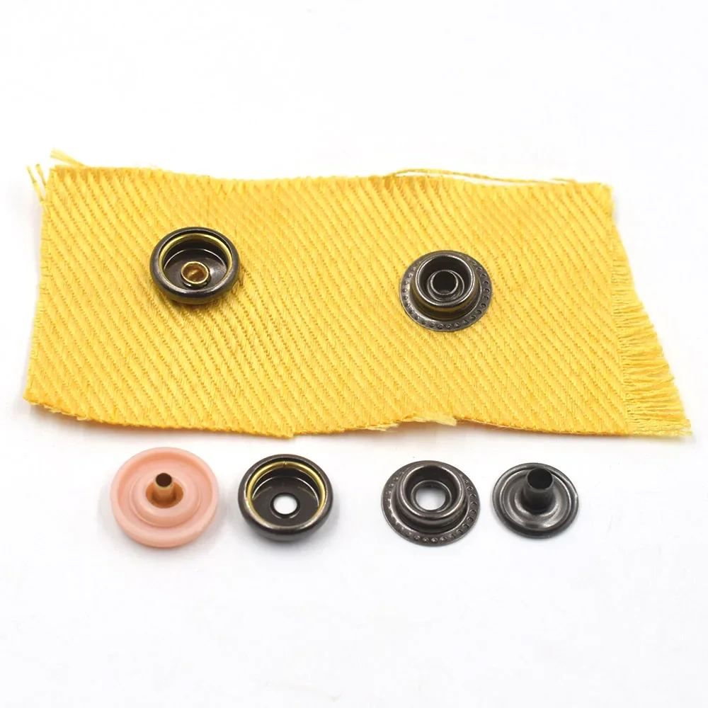 20sets buttons with 2 manual tools, fastener hammer sticks,hole puncher,ring Spring type brass snaps,nylon cap,DIY accessories