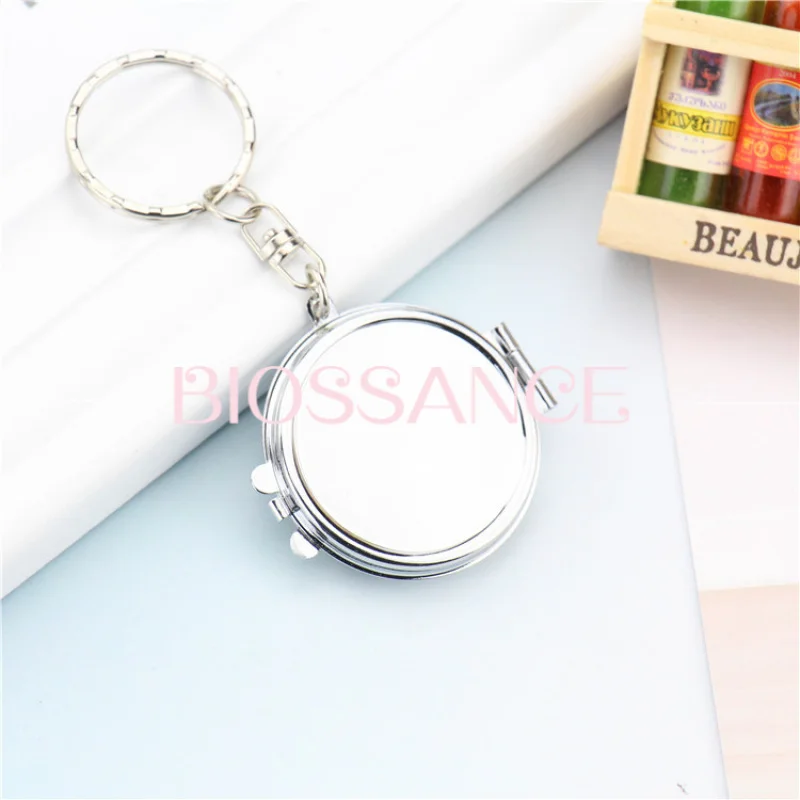 BIOSSANCE New Fashion Double-Sided Folding Mini Cosmetic Mirror, 50-Year Perpetual Calendar Keychain For Men And Women Jewelry