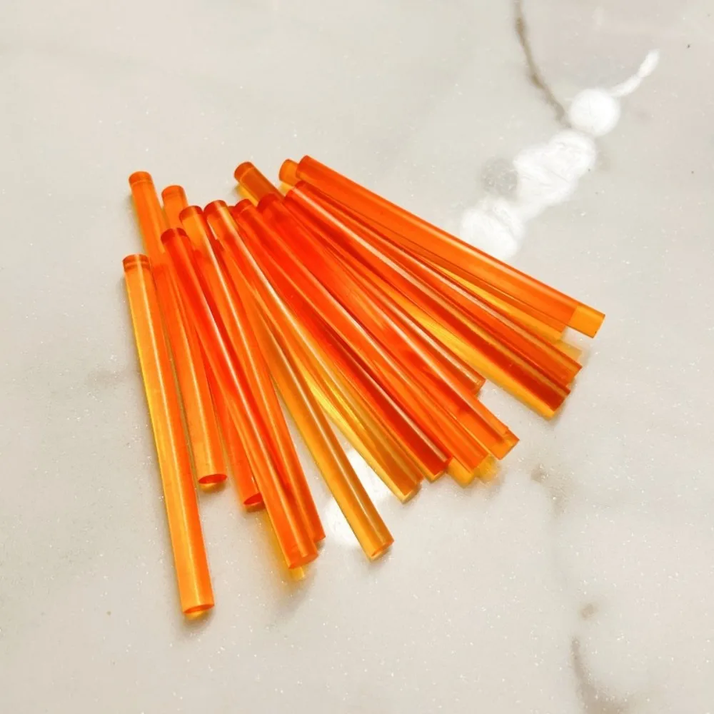 20 stks/partij Transparant oranje smeltlijmstift Elastische kracht Rubberen strip DIY Zeemeermin Tranen