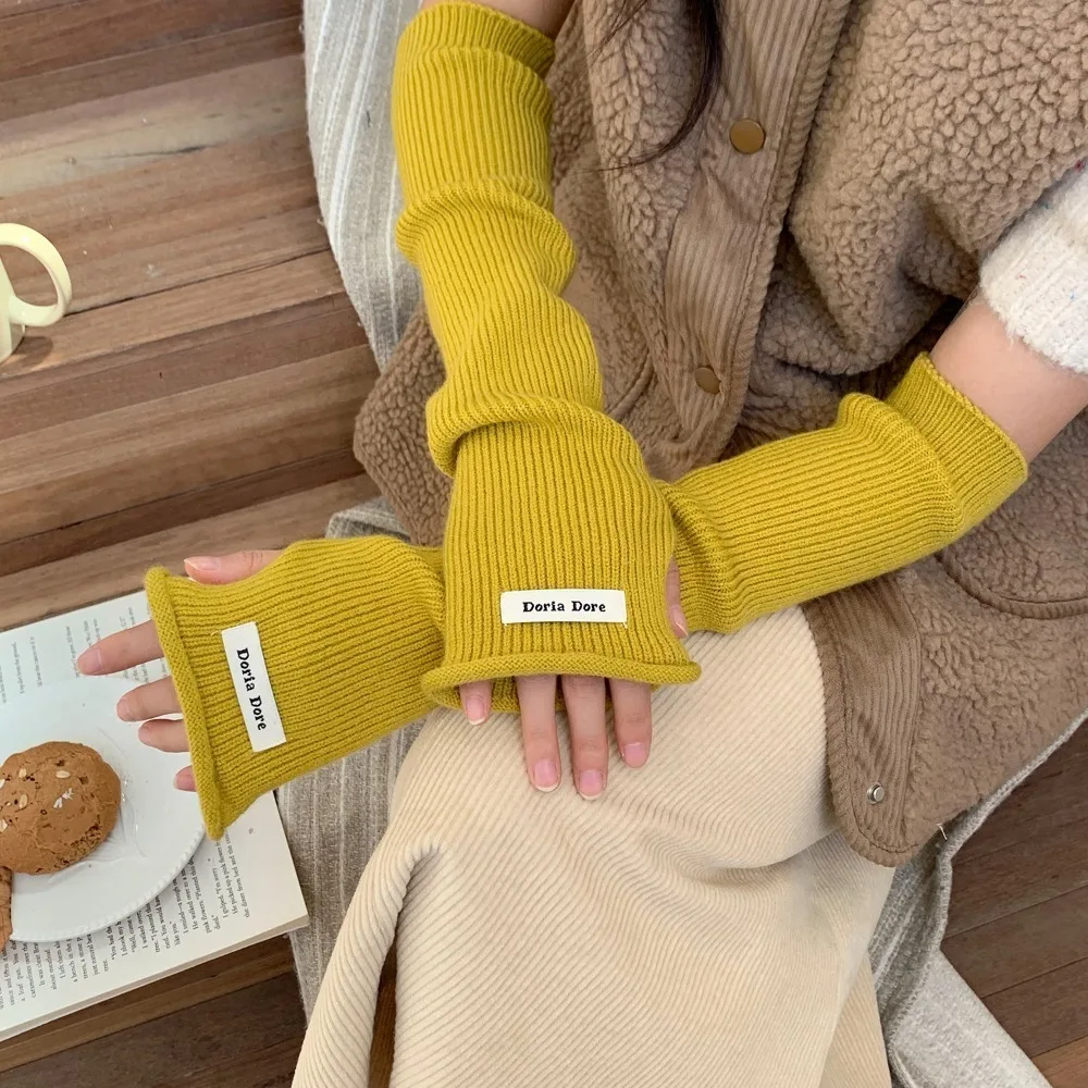 Estilo coreano tejido mangas cálidas Color sólido agujero mangas largas sin dedos dulce elástico guantes de brazo de lana niñas