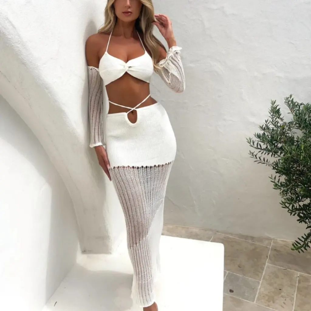 Conjunto de bikini sexy de dos piezas para mujer Ropa de playa con diseño calado con suéter y falda Estilo europeo y americano de moda