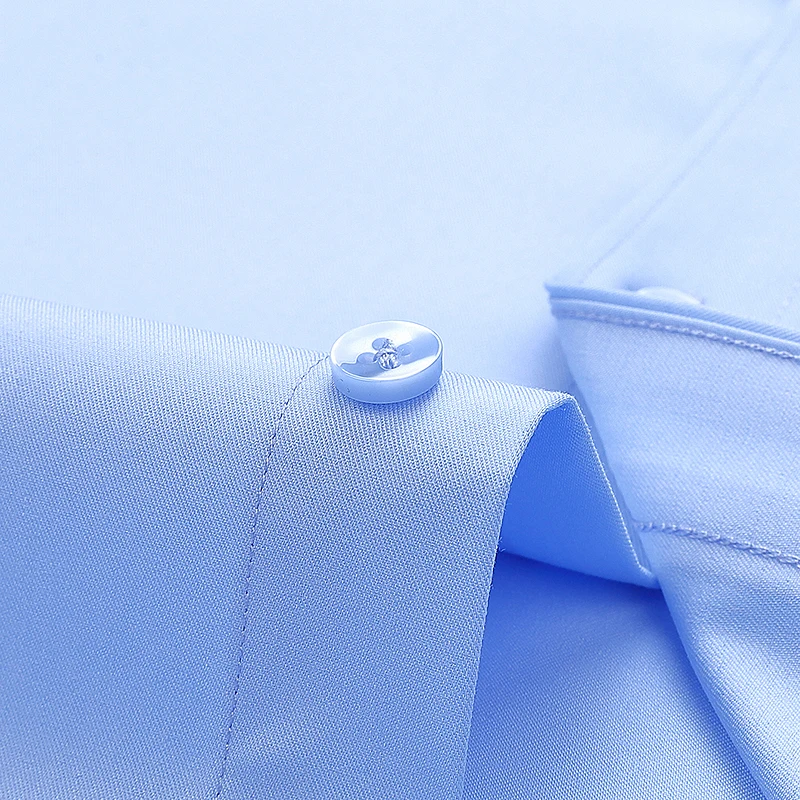 ไม่มีเหล็กต่อต้านริ้วรอย 8XL ผ้าใหม่ 50% เส้นใยไม้ไผ่ 46% โพลีเอสเตอร์ 4% สแปนเด็กซ์ชายเสื้อแขนยาวธุรกิจเสื้อทํางานนุ่มสบาย
