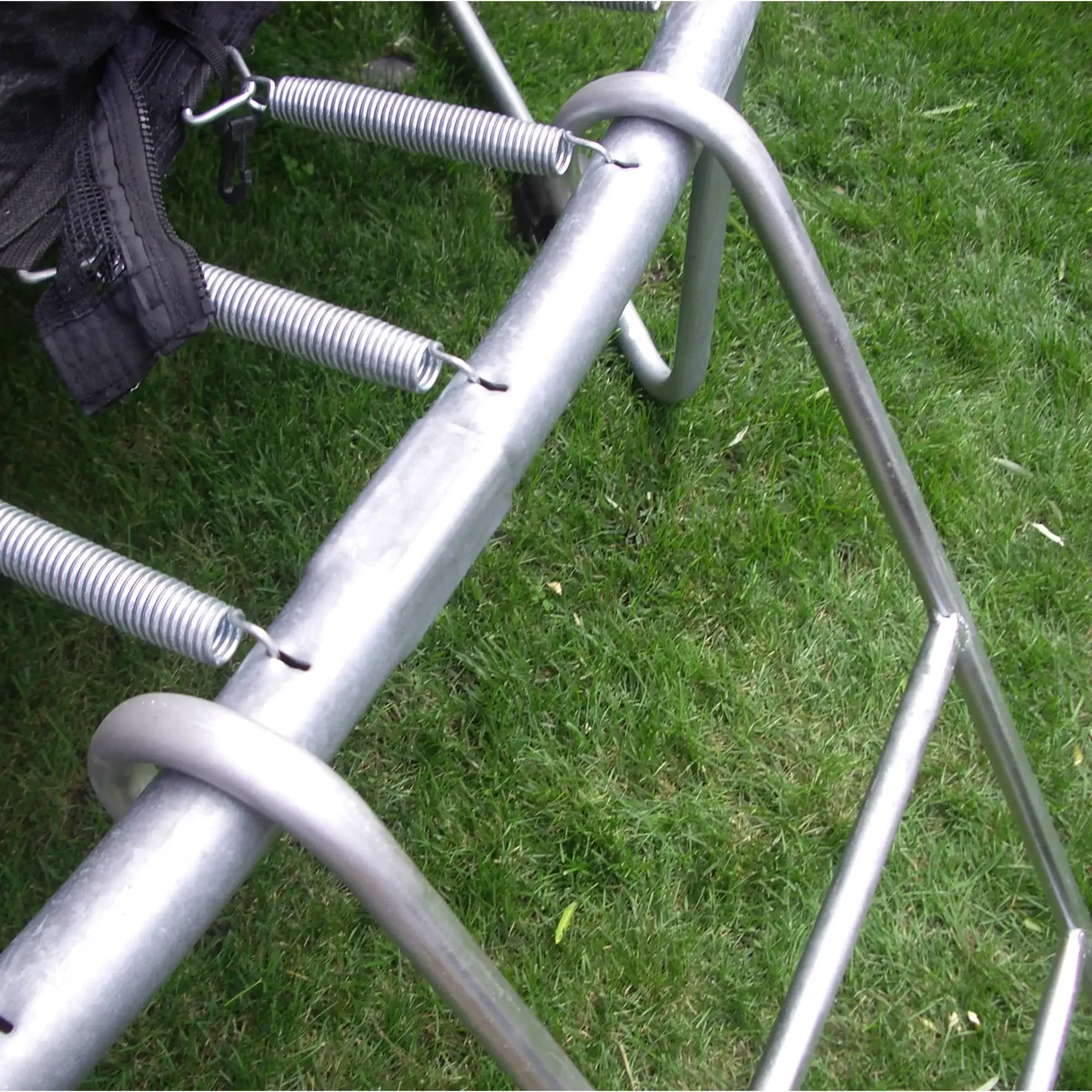 3-step ladder made of weather-resistant galvanized steel easily hooks onto the trampoline for quick installation