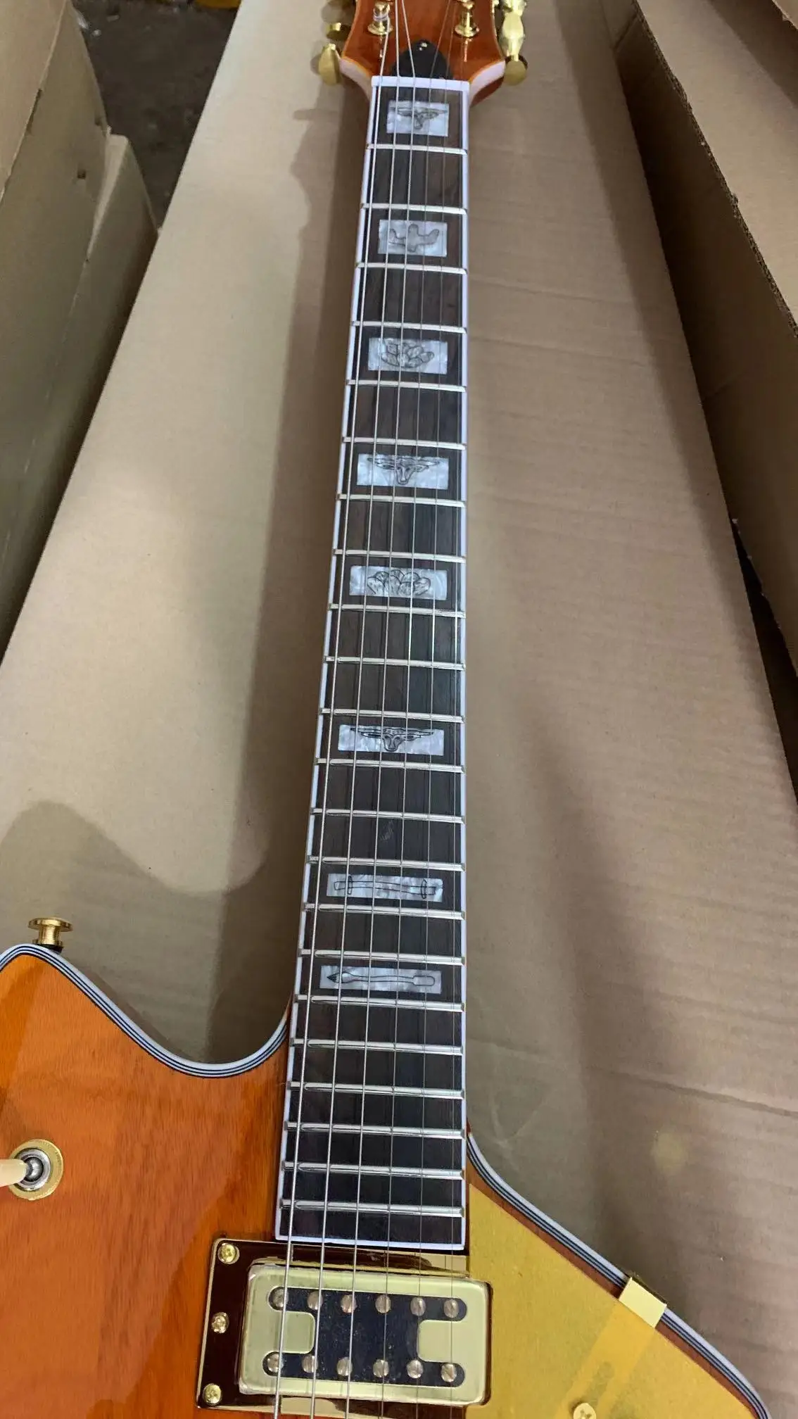 Factory direct inventory 6 string jazz electric guitar, transparent yellow body, golden jazz rocker bridge, free shipping
