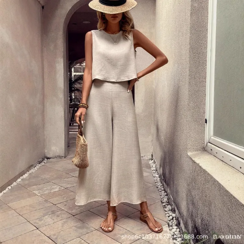 

Европейский и американский элегантный женский комплект из хлопка и льна: свободный топ без рукавов и широкие брюки. Новинка лета для делового стиля.