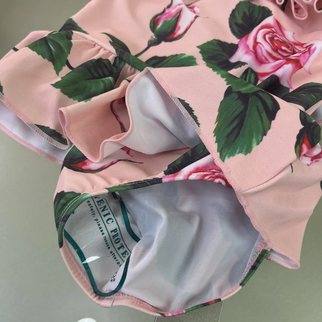 2025 nieuwe roze meisjesbadpak meisjes bikinizwempak met bloemenprint uit één stuk sling-badpak kwaliteit kinderzwemkleding