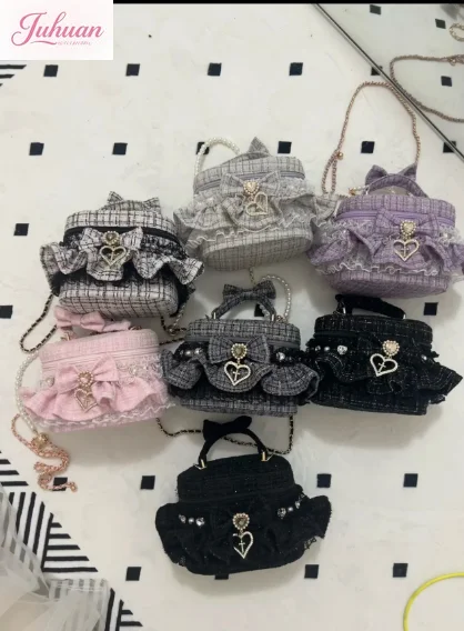 

Japanese mass-produced mine series Lolita bow ruffle edge rhinestone handheld shoulder messenger bag versatile bud bucket bags