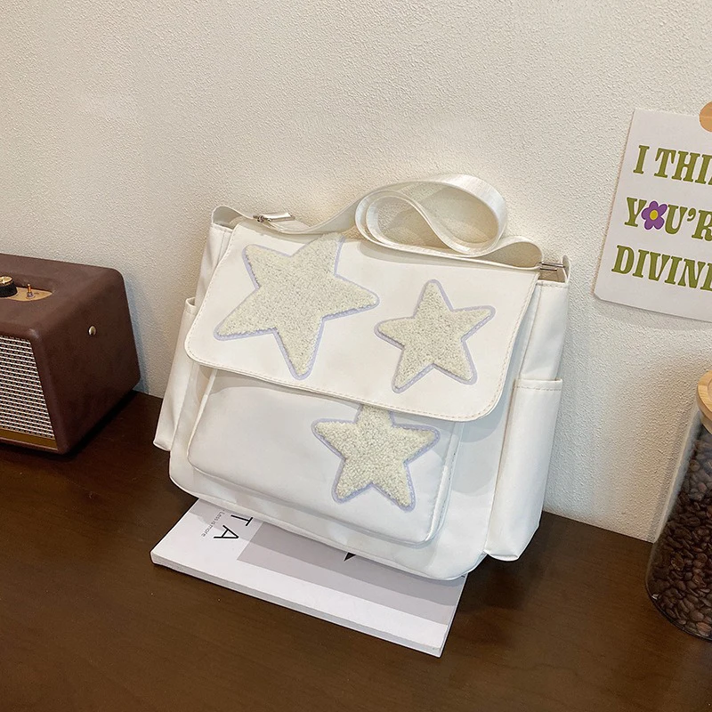 2025 حقيبة كروسبودي أنثى النمط الياباني تصميم متخصص فئة النجوم حقيبة كتف الترفيه حقيبة ساعي البريد للنساء