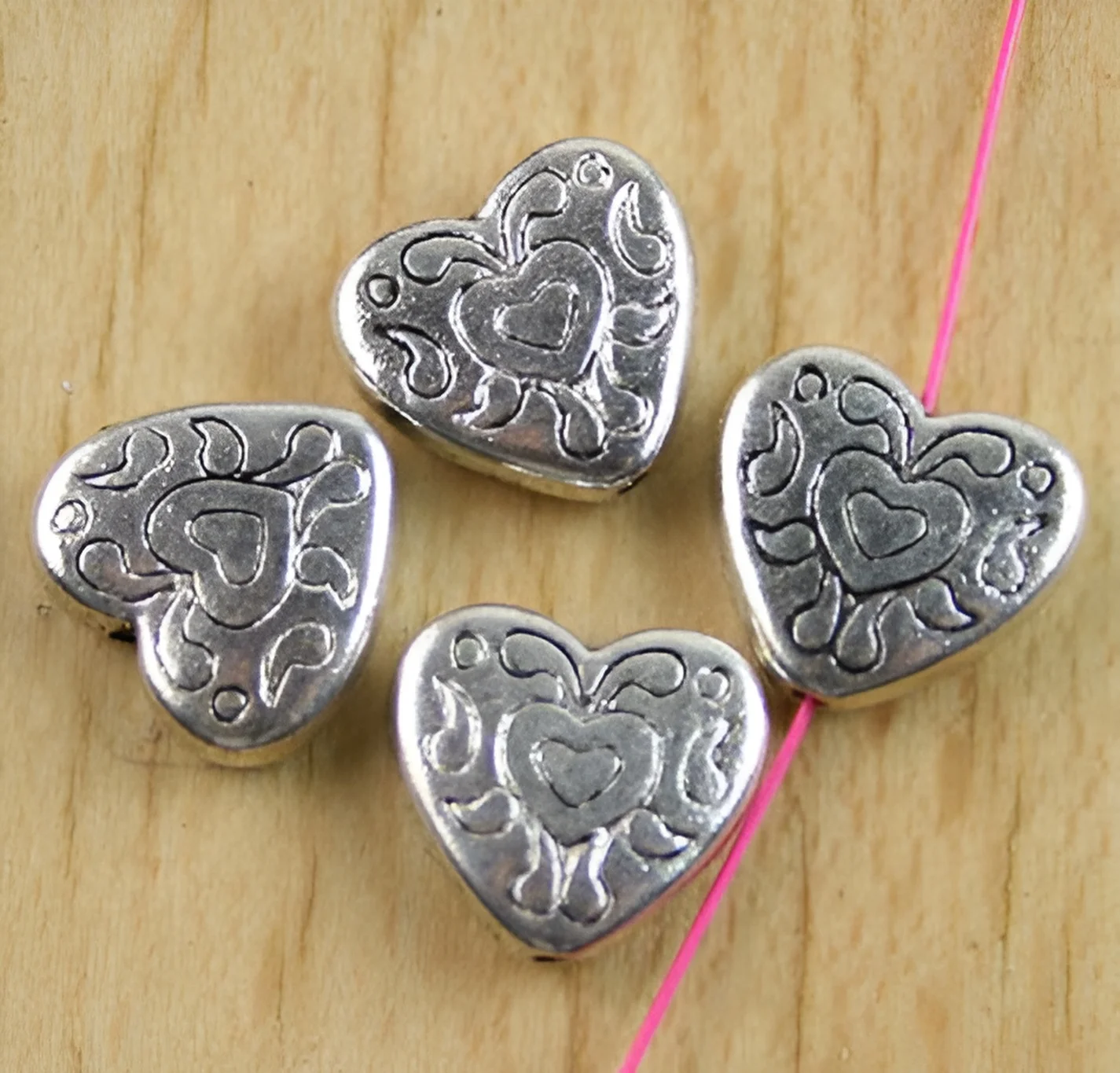 

10pcs 11x10mm Alloy matel tibetan silver 2sided crafted heart shaped beads HWH0135