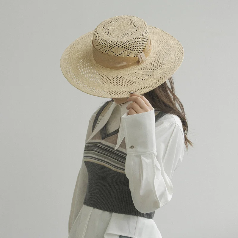 Women's Openwork Flower Woven Large Brimmed Straw Hat Spring and Summer Hand Woven Wide Ribbon Bow Papyrus Flat Top Beach Hat