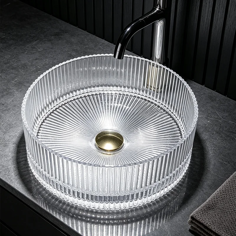 Transparent Glass Countertop Basin, with a Simple and Elegant Round Shape, Allowing Light to Penetrate and Reflect Dynamic Shadows, Creating a Rich Atmosphere. the Three-Dimensional Straight-Line Design Enhances the Layering of Light and Shadow, Making It an Ideal Choice for Modern Bathroom Fixtures, Suitable for Dressing Rooms, Vanity Tables, and Home Bathroom Sinks, and Can Be Matched with Various Decor Styles (Accessories Not Included)