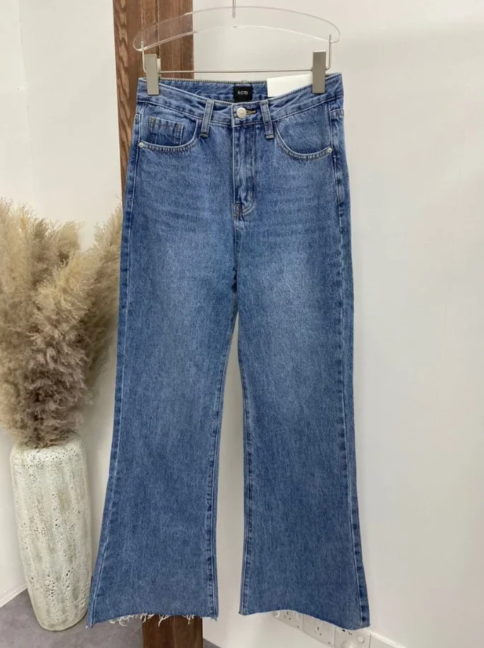 Jeans da donna pantaloni in Denim a gamba larga a vita alta pantaloni lunghi con orlo a nappa strappati Streetwear