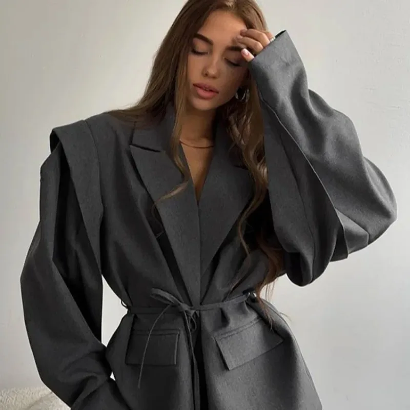 

Европейская и американская модная женская куртка с V-образным вырезом, завязками на талии, свободного кроя и универсального стиля.