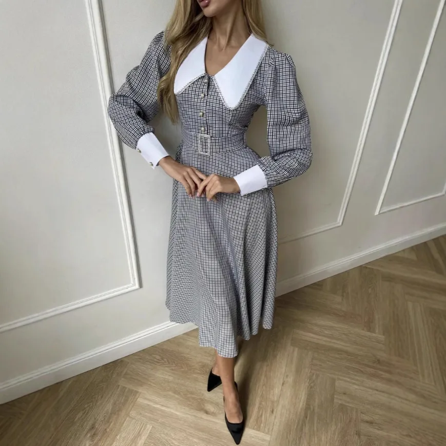 فستان أنيق ذو طية صدر السترة على الطراز الفرنسي ذو طية صدر السترة من الدانتيل منقوش أنيق بصدر واحد وأكمام منتفخة مع حزام خصر