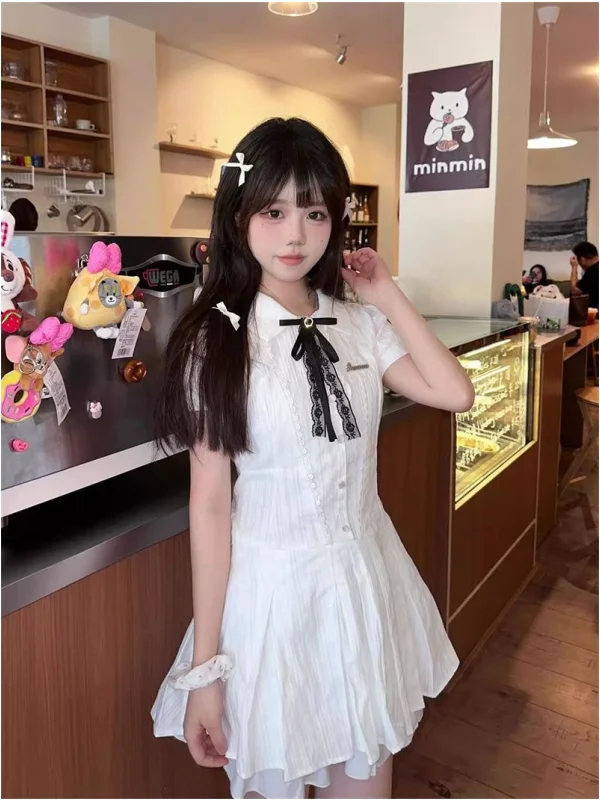 Letnia, słodka, herbaciana przerwa na herbatę, wyszczuplająca talia, kołnierzyk ort Dr, damska biała spódnica w kształcie litery A, pojedynczy element.