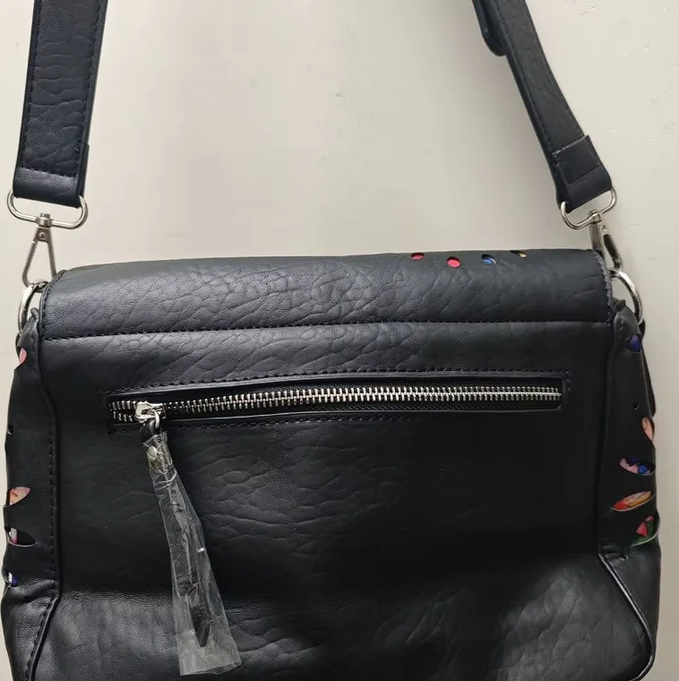 

European, American, Spanish original single backpack, light luxury, fashionable hollow flower designer's large capacity backpack