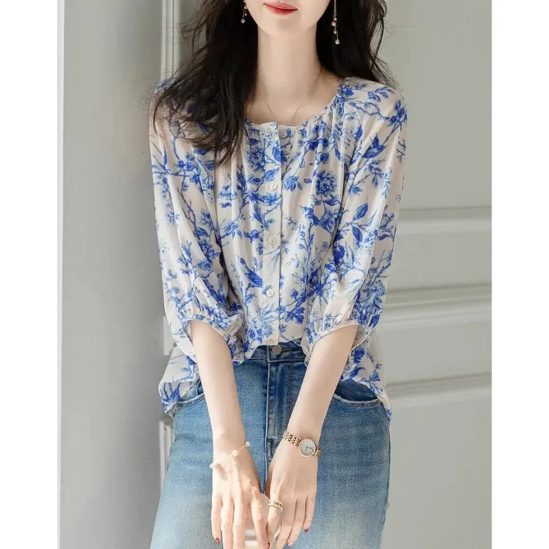 

Women's Blue Floral Print Chiffon Blouse Round Neck 3/4 Puff Sleeve Button Down Casual Top