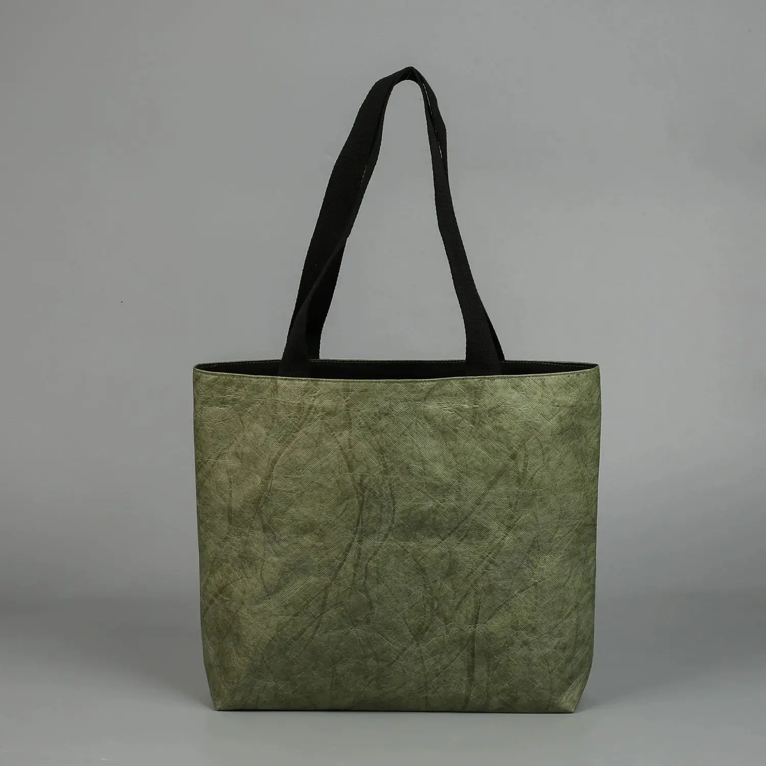 

The Handbag Can Be Customized with Eco-friendly Washed Logo Canvas Kraft Paper Handbag and High-looking Shoulder Shopping Bag.