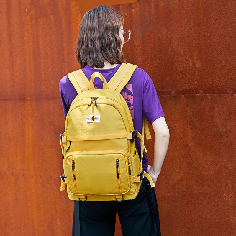 Mochila impermeable para escuela secundaria, bolsa grande con puerto usb para libros, color amarillo y negro, para adolescentes, niños y niñas