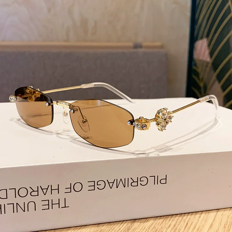

New Fashion Alloy Elegant Rimless Small Round Cystal Shiny Sunglasses For Women Y2K Sun Glasses Lady Rhinestone Shades Eyewears