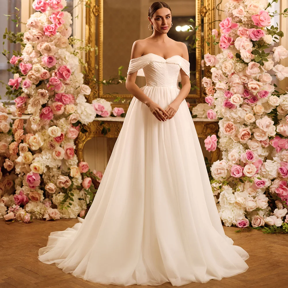 فستان زفاف من Vestidos De Novia مخصص قبالة الكتف ورقبة على شكل V لؤلؤ مطرز على شكل حرف A سويب تراين ناعم من التل فستان العروس