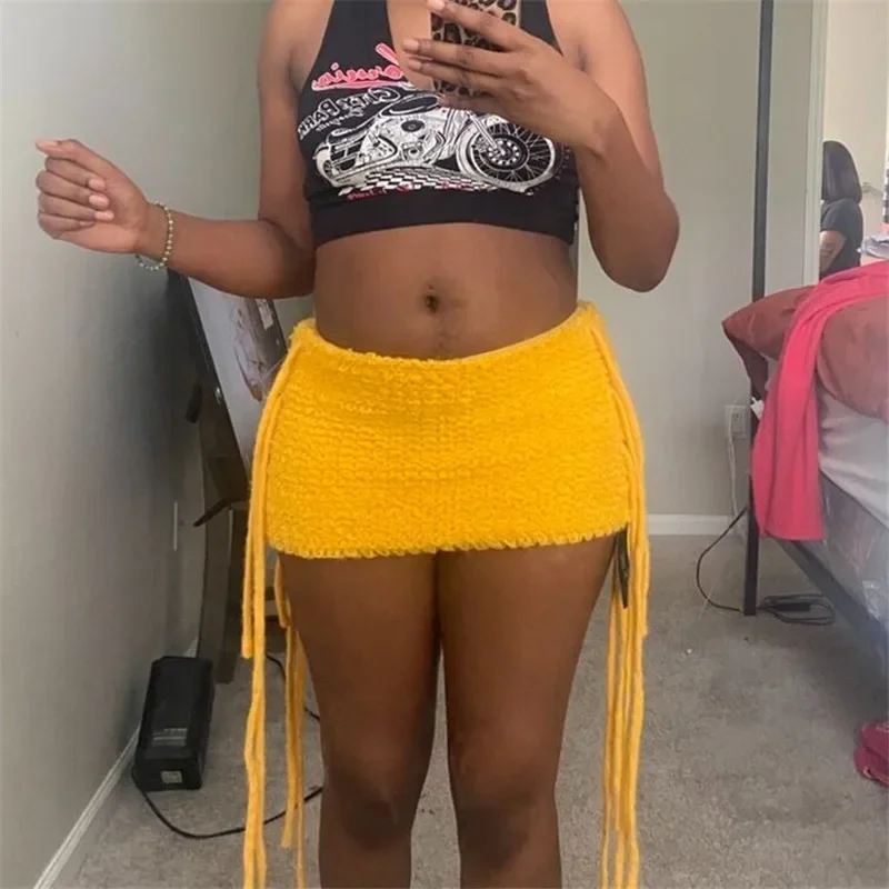 Women Textured Knit Mini Skirt Summer Fashion Solid Color Low Rise Short Skirts with Long Fringe Side Ties and Raw Edges