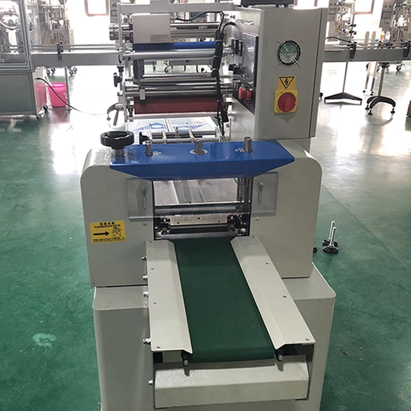 บะหมี่กึ่งสําเร็จรูปเครื่องบรรจุถุงหมอนแนวนอนอัตโนมัติอาหารขนมขบเคี้ยวเครื่องบรรจุสบู่ช็อคโกแลตสามารถปรับแต่งได้