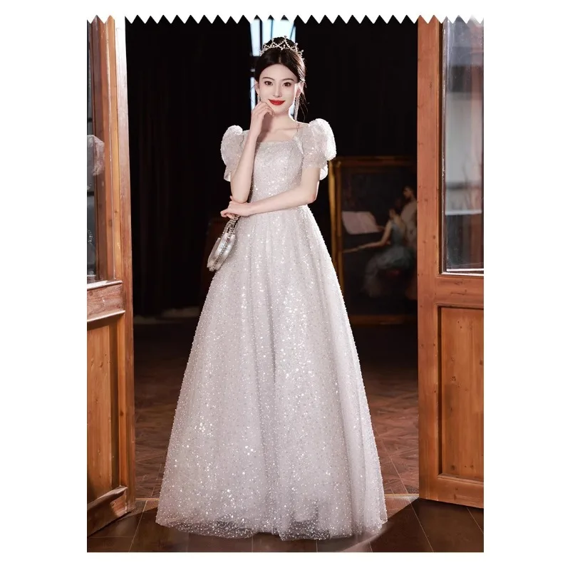 Abito da sera francese con paillettes grigio argento con spalline, spettacolo di nicchia, esame d'arte di compleanno, abito da principessa di laurea